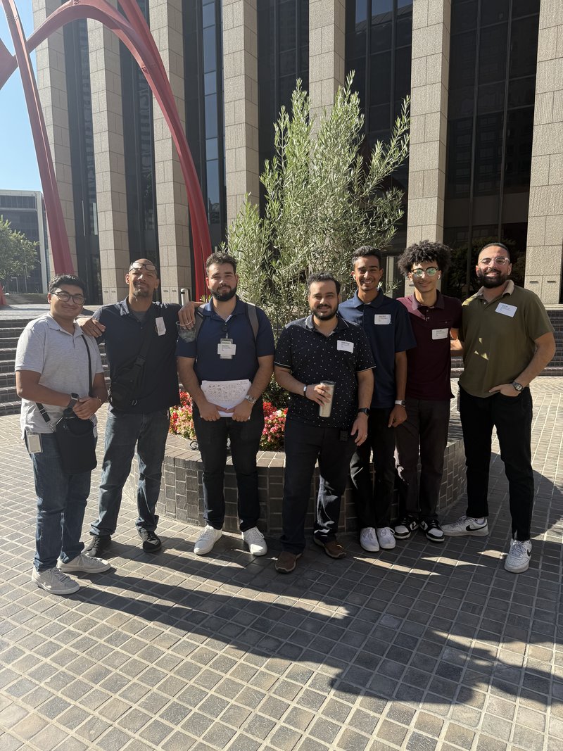 Seven members of the Core Net Pro team together outdoors