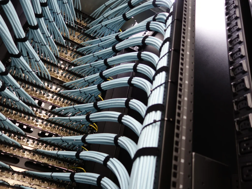 Organized network cabling and patch panels inside an equipment rack
